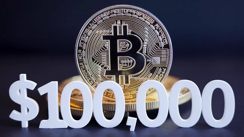 Биткоинот надмина 100.000 долари за прв пат во историјата